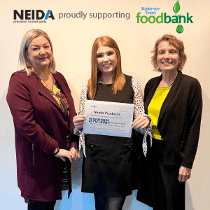 Lauren Brown, Marketing Executive, being presented with The Foodbank Certificate